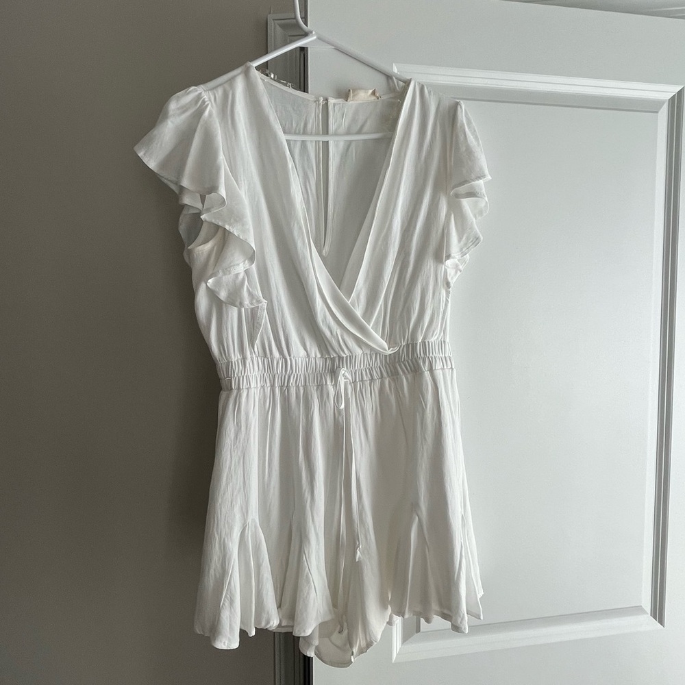 Altar’d State romper size Large. Good condition. Smoke free pet free home